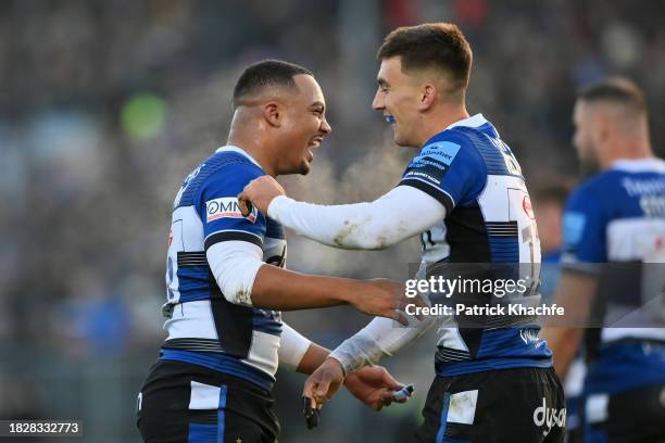 Cameron Redpath of Bath Rugby celebrates scoring the opening try of the match with team-mate Max Ojomoh during the Gallagher Premiership Rugby match...