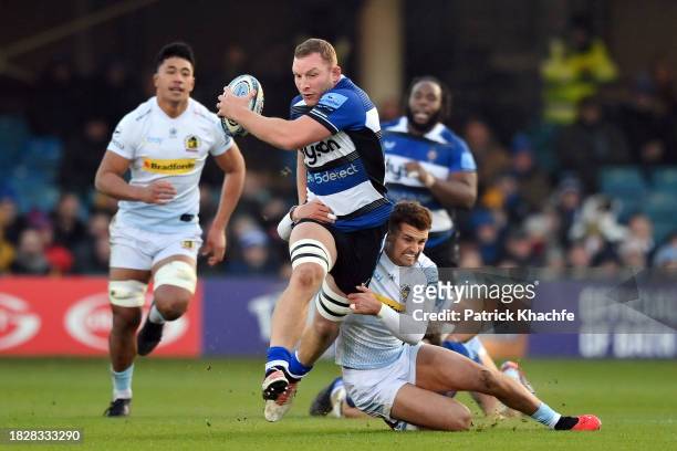 Sam Underhill of Bath Rugby is tackled by Henry Slade of Exeter Chiefs during the Gallagher Premiership Rugby match between Bath Rugby and Exeter...