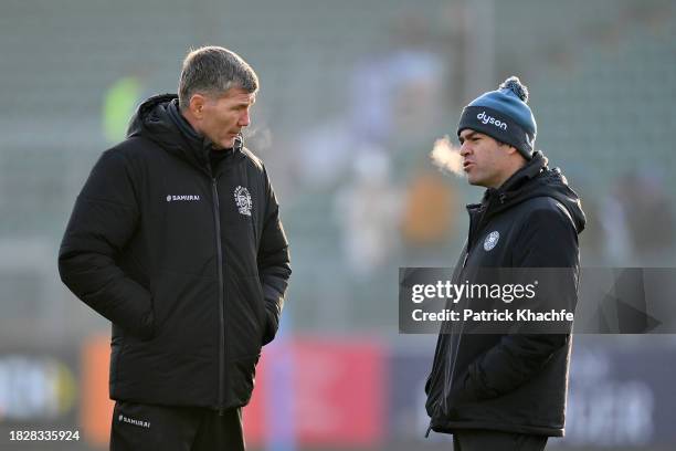 Rob Baxter, Exeter Chiefs Director of Rugby, speaks with Johann van Graan, Bath Head of Rugby, during the Gallagher Premiership Rugby match between...