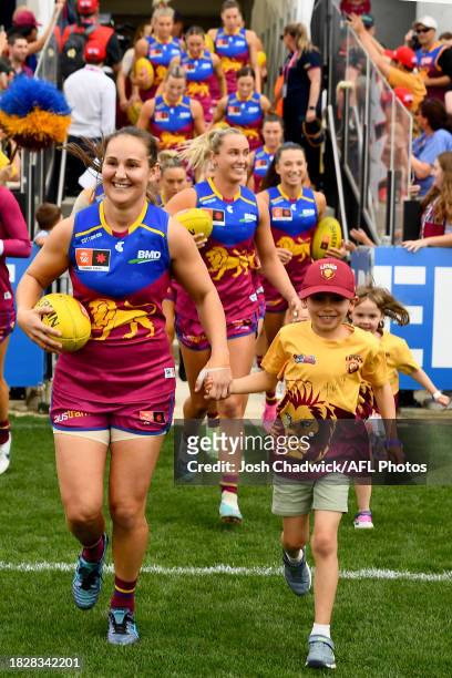 Breanna Koenen of the Lions runs out onto the field during the AFLW Grand Final match between North Melbourne Tasmania Kangaroos and Brisbane Lions...
