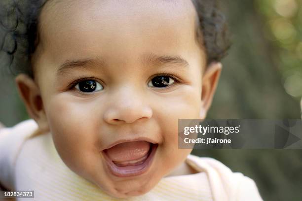 close up cute african american baby outdoors - cute arab girls stock pictures, royalty-free photos & images