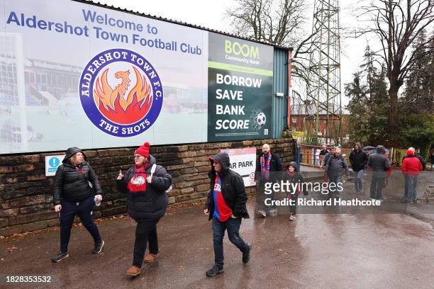 General view outside the stadium of fans walking to the entrance during the Emirates FA Cup Second Round match between Aldershot Town and Stockport...