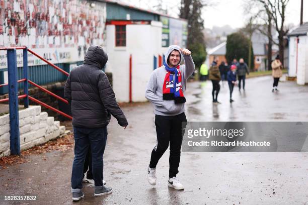 An Aldershot Town fan is seen gesturing prior to the Emirates FA Cup Second Round match between Aldershot Town and Stockport County at The Electrical...