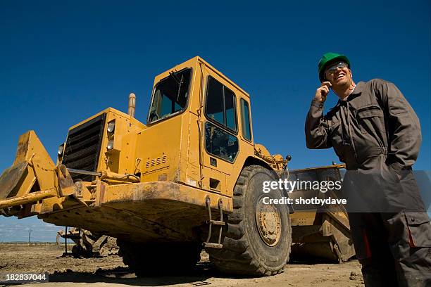 Contractor Loading 335 Contractor Loading Truck Stock Photos, High-Res Pictures, and ...