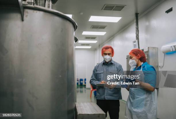 asian inspector routine check on plant quality control - dairy factory worker stock pictures, royalty-free photos & images
