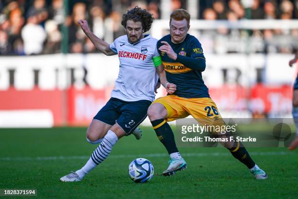 Mael Corboz of Verl and Paul Will of Dresden fight for the ball during the 3. Liga match between SC Verl and Dynamo Dresden at SPORTCLUB Arena on...