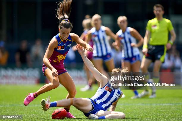 Jade Ellenger of the Lions and Tess Craven of the Kangaroos compete for the ball during the AFLW Grand Final match between North Melbourne Tasmania...