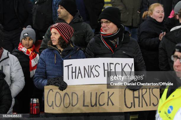 Sheffield United fans hold up signs thanking Paul Heckingbottom and wishing new manager Chris Wilder luck during the Premier League match between...