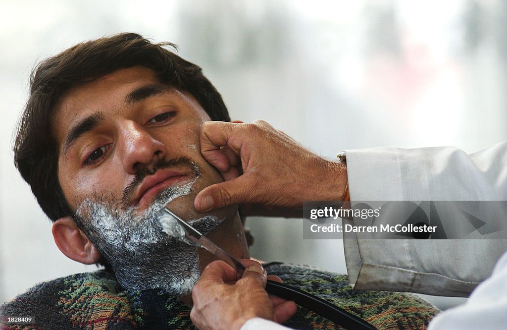 Afghan Men Have Beards Trimmed And Shaved