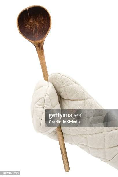 holding a wooden spoon - träsked bildbanksfoton och bilder