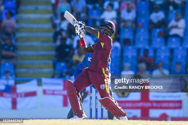 Sherfane Rutherford of the West Indies hits 6 during the 2nd ODI match between the West Indies and England at Vivian Richards Cricket Stadium in...