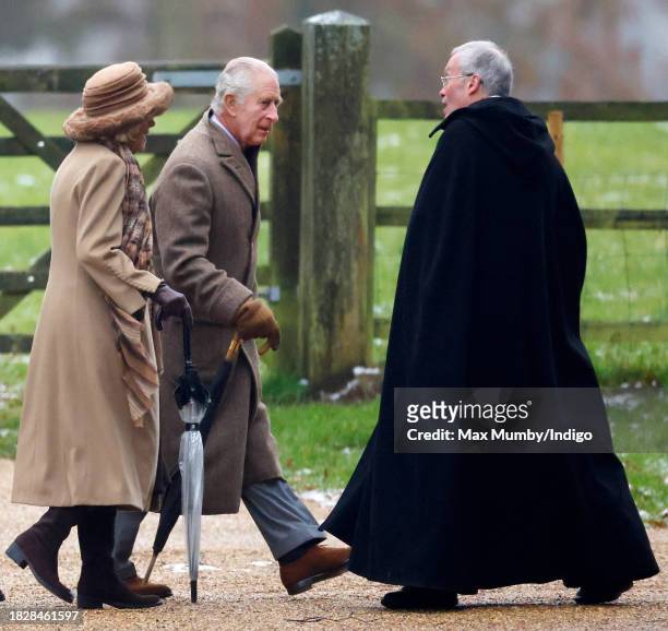 King Charles III and Queen Camilla are greeted by The Reverend Canon Dr Paul Williams as they attend the Advent Sunday service at the Church of St...