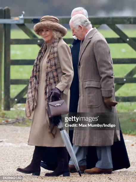 King Charles III and Queen Camilla depart after attending the Advent Sunday service at the Church of St Mary Magdalene on the Sandringham estate on...