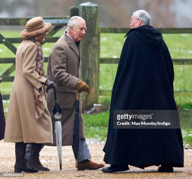King Charles III and Queen Camilla are greeted by The Reverend Canon Dr Paul Williams as they attend the Advent Sunday service at the Church of St...