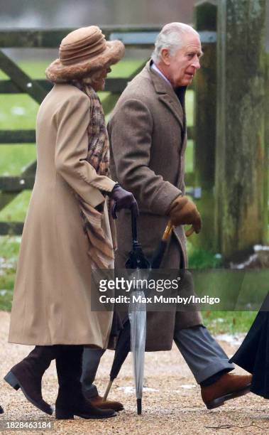 King Charles III and Queen Camilla attend the Advent Sunday service at the Church of St Mary Magdalene on the Sandringham estate on December 3, 2023...