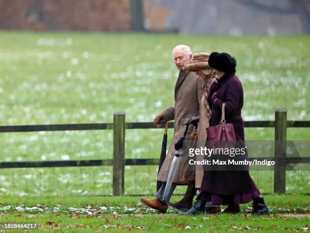 King Charles III and Queen Camilla depart after attending the Advent Sunday service at the Church of St Mary Magdalene on the Sandringham estate on...