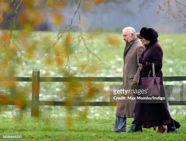 King Charles III departs after attending the Advent Sunday service at the Church of St Mary Magdalene on the Sandringham estate on December 3, 2023...