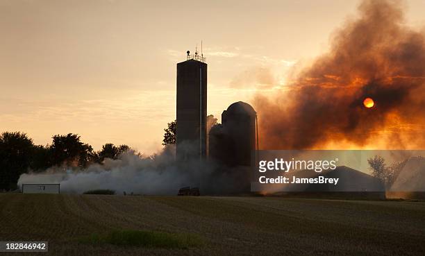 barn fire at sunset - extreme weather farm stock pictures, royalty-free photos & images