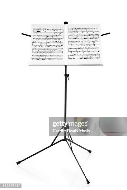 stand with sheet music - muziekstandaard stockfoto's en -beelden