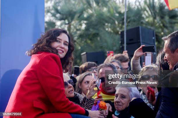 La presidenta de la Comunidad de Madrid, Isabel Diaz Ayuso, durante un acto del PP contra la amnistia se dirigen a Ferraz, a 3 de diciembre de 2023,...