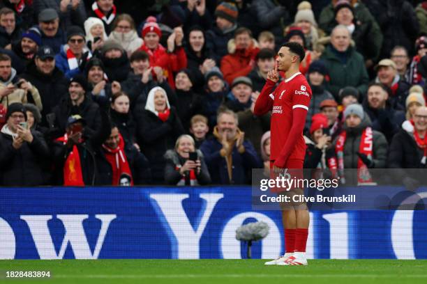 Trent Alexander-Arnold of Liverpool celebrates after scoring the team's first goal during the Premier League match between Liverpool FC and Fulham FC...