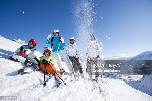 happy skiing group - happy skier stockfoto's en -beelden