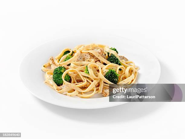 grilled chicken with broccoli fettuccini - white plate stock pictures, royalty-free photos & images