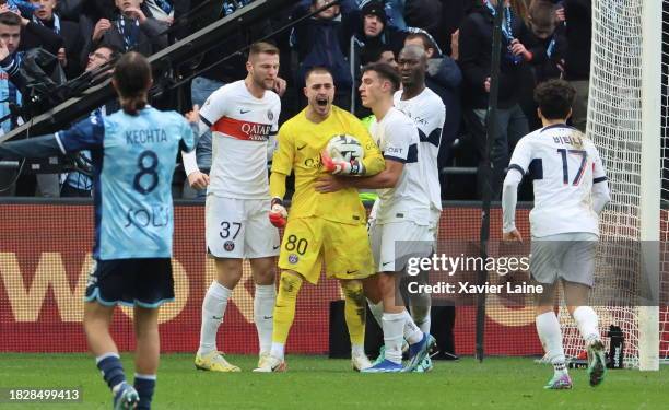 Arnau Tenas of Paris Saint-Germain celebrates the victory with teammates during the Ligue 1 Uber Eats match between Havre AC and Paris Saint-Germain...