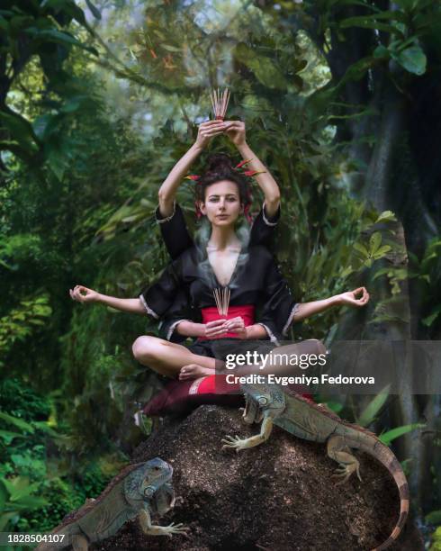 girl with six arms in the rainforest - sitting shiva stock pictures, royalty-free photos & images