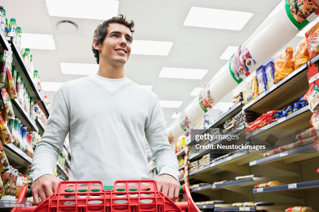 Young Man Shopping For Groceries