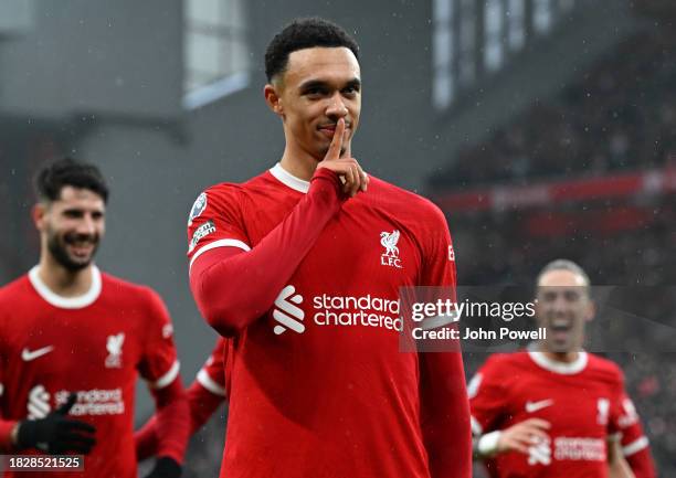 Trent Alexander-Arnold of Liverpool celebrates after scoring the opening goal during the Premier League match between Liverpool FC and Fulham FC at...