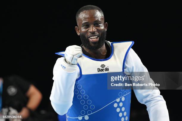 Cheick sallah Cisse of Ivory Coast celebrates his win in the Semi final against Pasko Bozic of Croatia in the Male +80kg category at Manchester...