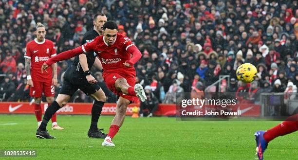 Trent Alexander-Arnold of Liverpool scores the opening goal during the Premier League match between Liverpool FC and Fulham FC at Anfield on December...