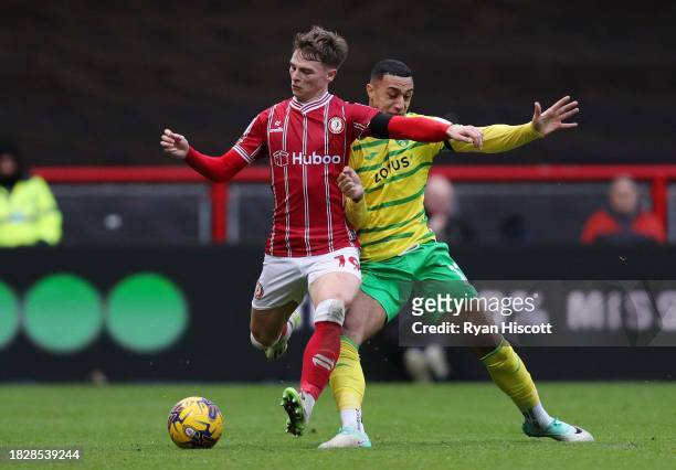 George Tanner of Bristol City is challenged by Adam Idah of Norwich City during the Sky Bet Championship match between Bristol City and Norwich City...