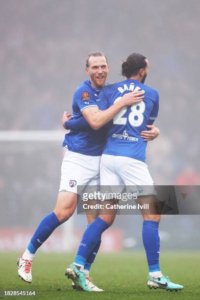 Jamie Grimes of Chesterfield celebrates with teammate Oliver Banks of Chesterfield after Brandon Cooper scores a own goal during the Emirates FA Cup...