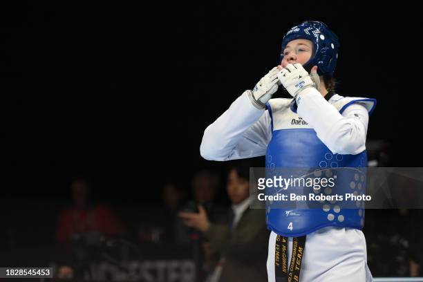 Rebecca Mcgowan of Great Britain celebartes her win in the Semi final against Solene Avoulette of France in the Female +67kg category at Manchester...