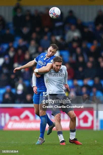 George Langston of Eastleigh and Sam Smith of Reading battles for possession with in the air during the Emirates FA Cup Second Round match between...
