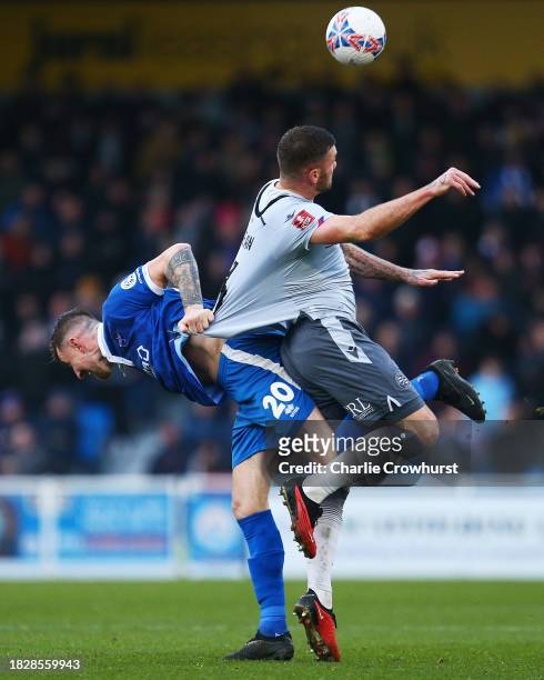 Harlee Dean of Reading is challenged by Bailey Clements of Eastleigh during the Emirates FA Cup Second Round match between Eastleigh and Reading at...