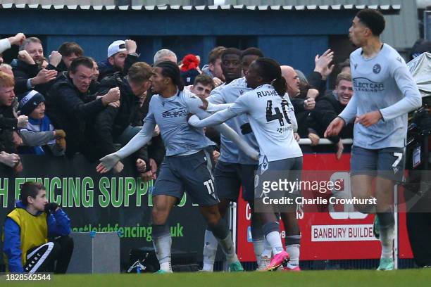 Femi Azeez of Reading celebrates with teammates after scoring the team's first goal during the Emirates FA Cup Second Round match between Eastleigh...