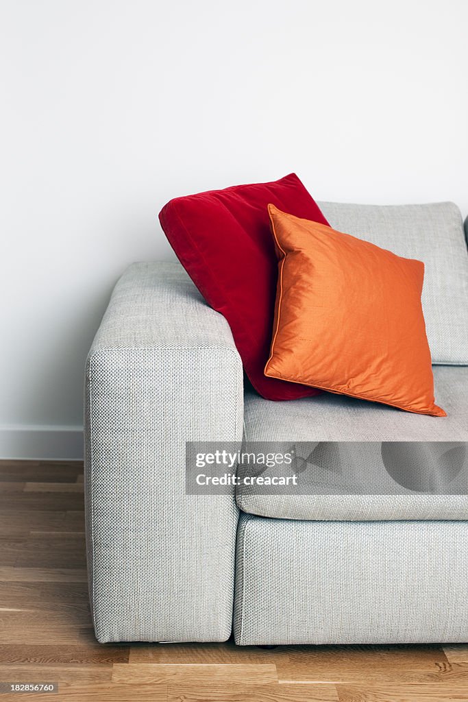 Sofa with bright coloured cushions