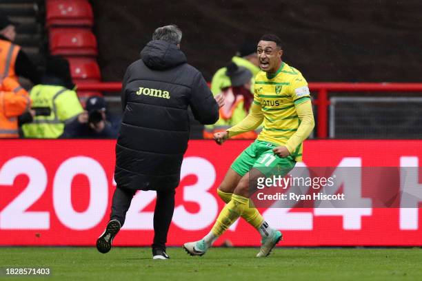 Adam Idah of Norwich City celebrates scoring the teams second goal with David Wagner, Manager of Norwich City, during the Sky Bet Championship match...