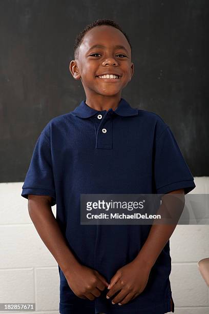 proud schoolboy - african american school uniform stock pictures, royalty-free photos & images