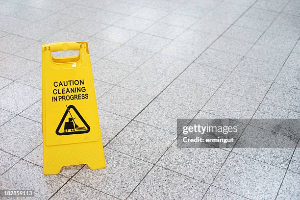 cleaning in progress sign on the slippery floor - slippery stock pictures, royalty-free photos & images