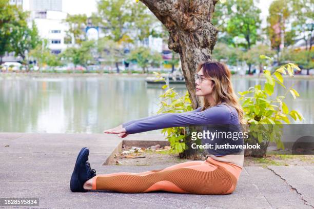 thai transgender sitting  in  yoga position - kathoey stock pictures, royalty-free photos & images