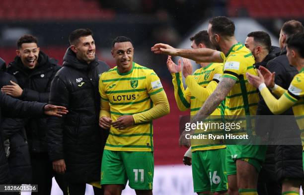 Adam Idah of Norwich City celebrates the teams win with teammates after the Sky Bet Championship match between Bristol City and Norwich City at...