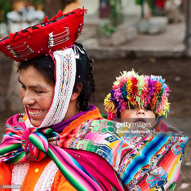 peruvian woman with her baby on the back, ollantaytambo - quechua stock pictures, royalty-free photos & images