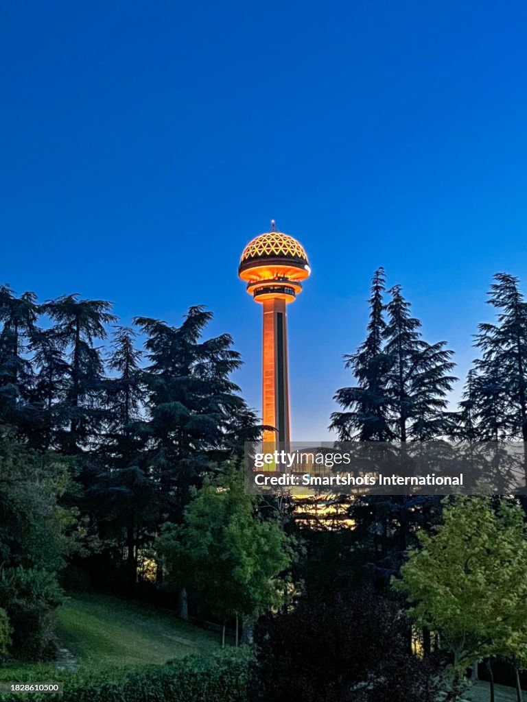 "Atakule tower" illuminated at late dusk in Cankaya, Ankara, Turkey