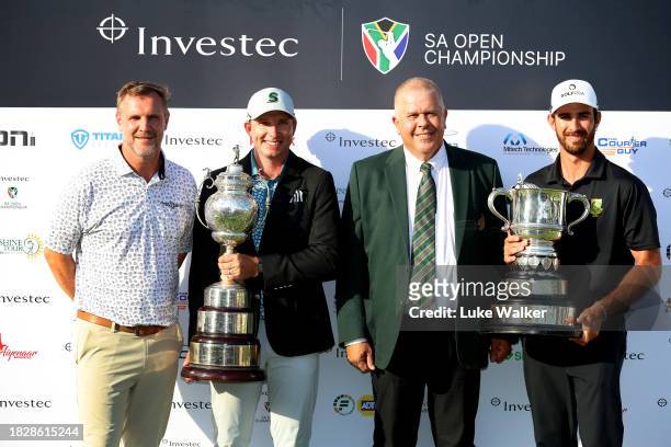 Dean Burmester of South Africa and Altin Van Der Merwe of South Africa pose with winner and leading amateur trophies during day four of the Investec...