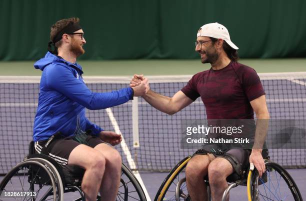 Mark Langeveld and Rob Teague interact whilst playing Gary Cox and Kevin Lewis during the Wheelchair Tennis National Finals 2023 at The Shrewsbury...