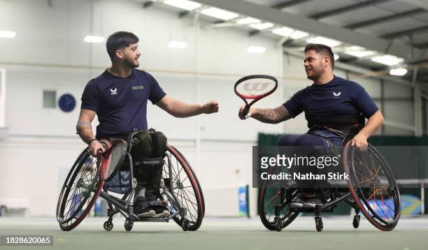 Gary Cox and Kevin Lewis interact as they play against Mark Langeveld and Rob Teague during the Wheelchair Tennis National Finals 2023 at The...